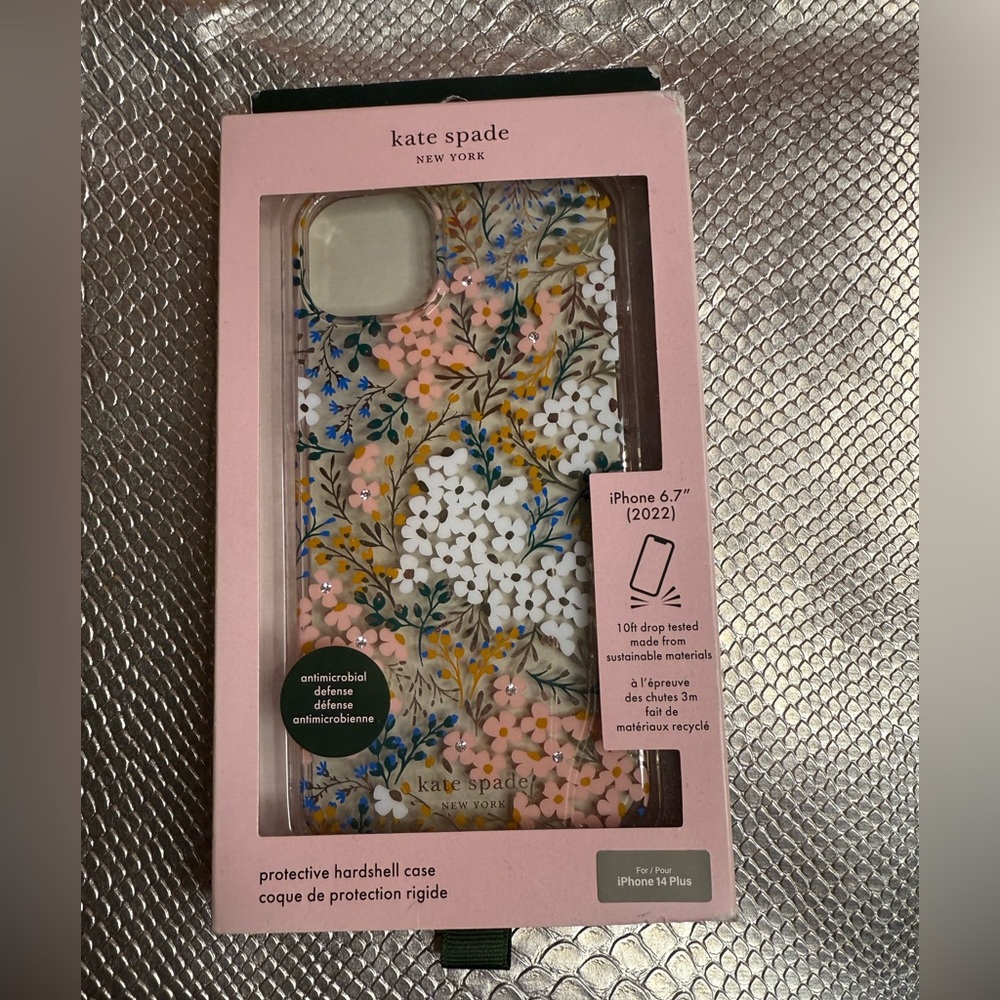 Kate Spade- Clear Floral iphone case. 14 PLUS.